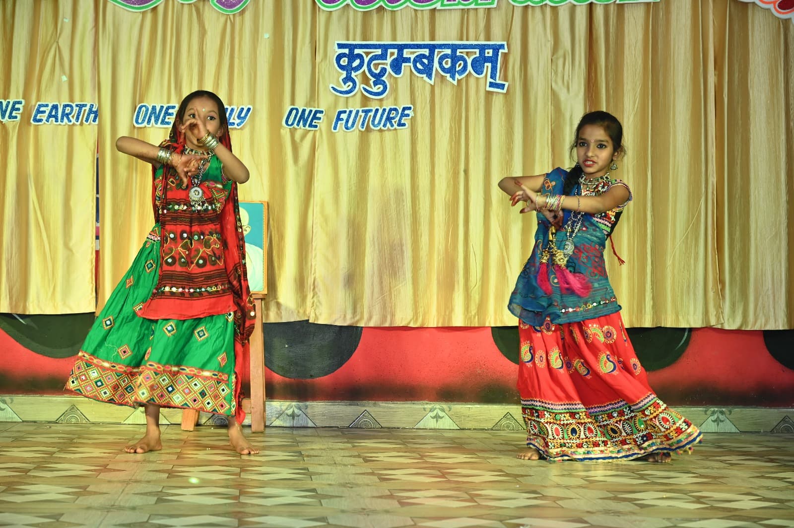 Students performing a folk dance in traditional dress