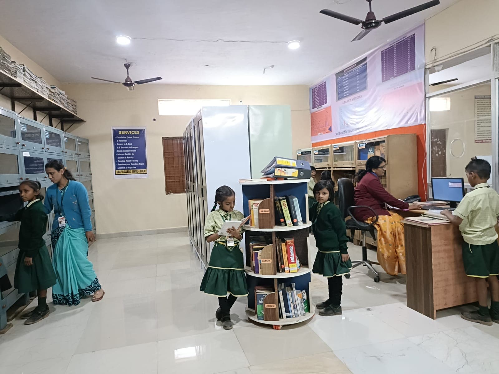 Students browsing books in the school library
